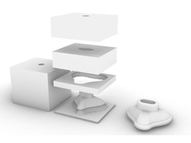 Exploded render of a multi-part mold and the cast part